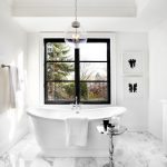 black window frames in white room