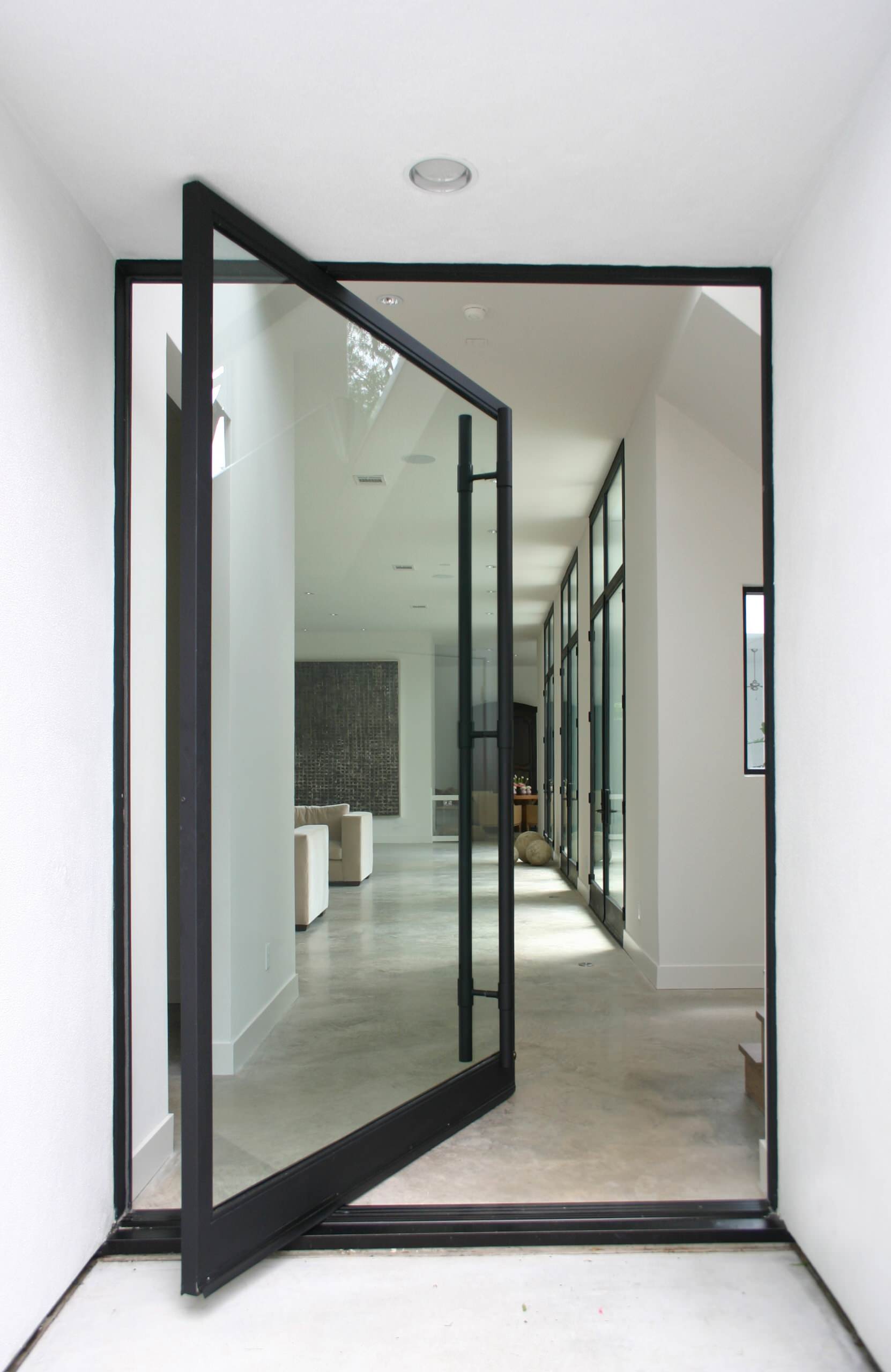 glass-revolving-hinged-patio-door-with-a-view
