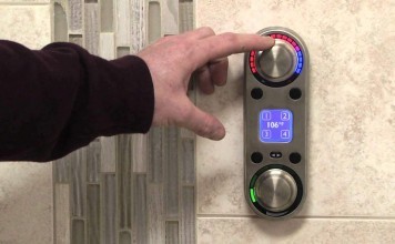 A-digital-shower-control-in-use-future-of-bathroom-technology