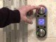 A-digital-shower-control-in-use-future-of-bathroom-technology