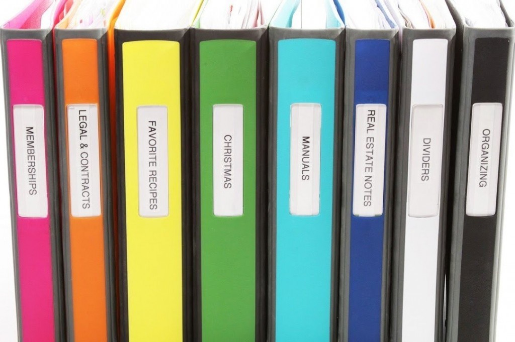assortment-of-personally-labeled-binders-organizing-your-office-workspace