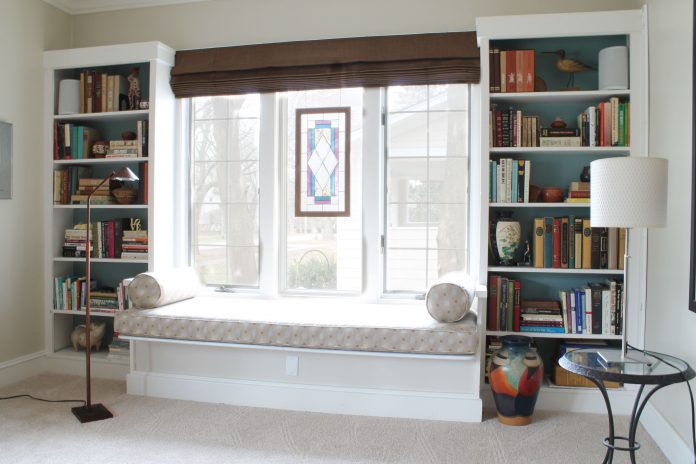 Bookcases-next-to-window-seat.-nice-reading-room-living-space-reading-nook