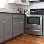gray-base-kitchen-cabinets-white-walls